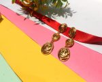 Elegant Golden Spiral Swirl Drop Earrings with Textured Multi-Oval Design - Image 2