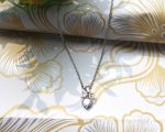 Dainty Bow & Crystal Pendant Necklace – Silver-Tone Charm Chain - Image 4