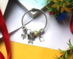 Emerald Whimsy Charm Bracelet – Butterfly Magnet & Heart Charms - Image 3