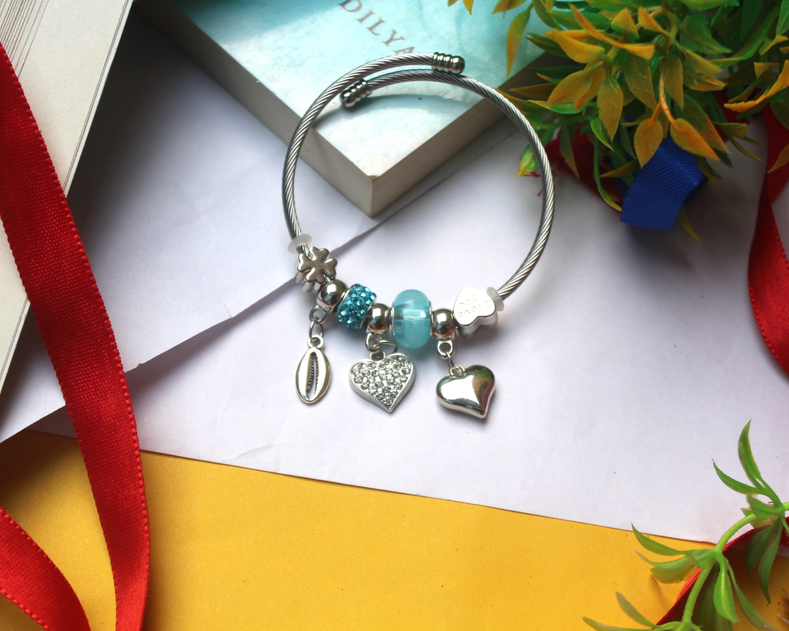 Luxury Silver Charm Bracelet with Blue Bead Luxury Silver Charm Bracelet with Blue Bead