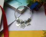 Ivory Grace Charm Bracelet – Butterfly, Love & Elephant Charms - Image 3