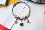 Silver-Tone Twisted Wire Charm Bracelet with Pink Glass Bead, Floral Accents & Dolphin Dangle - Whimsical Ocean Garden Collection - Image 4