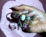 Chic Silver-Toned Statement Charm Bangle Bracelet with Love Pendant, Elephant, Shell, and Pearl-Inspired Accents for Modern Ethnic Style - Image 3