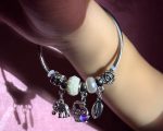 Chic Silver-Toned Statement Charm Bangle Bracelet with Love Pendant, Elephant, Shell, and Pearl-Inspired Accents for Modern Ethnic Style - Image 4